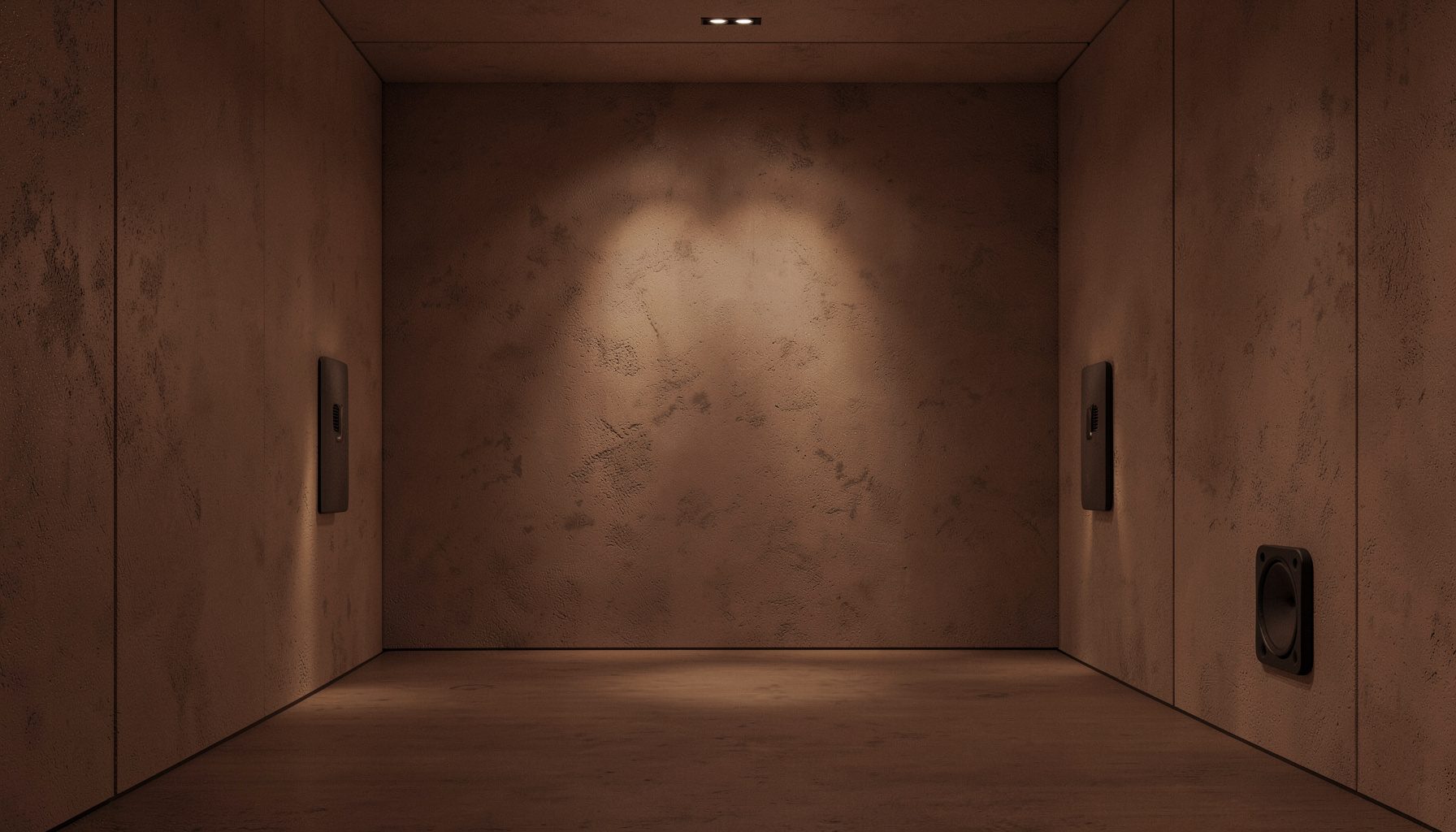 An intimate room with textured walls and subtle warm lighting, suggesting a quiet listening environment